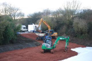 Hardcore being laid on former allotments alongside the car park at Charlbury station on December 10, 2010, to provide a site for a works compound and offices for engineers working on the redoubling project
