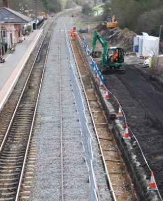 Work to build a new platform at Charlbury station for trains to Worcester in March 2011 uncovered the supporting wall of its predecessor, marked by cones in the picture