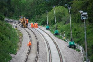 Work to lay new track under way at Shorthampton, near Chadlington, on Sunday, May 29, 2011.