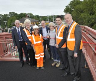 Opening the new footbridge at Charlbury on Monday, June 6, 2011, from left, John Ellis, chairman of the CLPG, Teresa Ceesay, Sharon Michell, passengers Bruce and Jackie Howard, James Ellis and David Northey. 