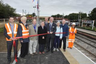 On the new platform at Charlbury, from left, James Ellis, Teresa Ceesay, Nick Potter, the chairman of the  town council, county councillor Neil Owen, David Northey, John Ellis, town councillors Nicolette Lethbridge and Gareth Miller and Sharon Michell
