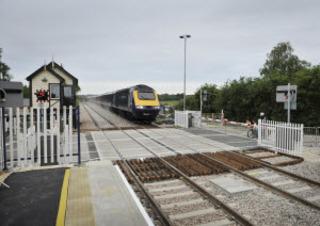 An express from Worcester approaches Ascott-under-Wychwood on new double track on Monday, June 6, 2011