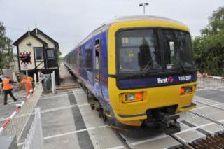 A First Great Western Turbo train leaves Ascott-under-Wychwood station on Monday, June 6, 2011