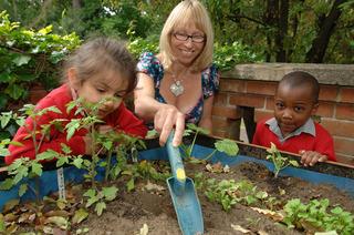 Rye St Antony School' s head of juniors Jo Reed with five-year-olds Lily-Rose Persaud-Stubbs and Blessing Oge-Evans