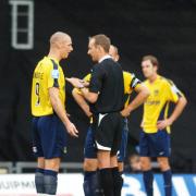 James Constable and referee Ian Cooper disagree over another decision – and this time the Oxford United striker says too much and is booked