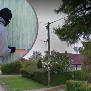 Men and woman 'threatened with crowbar' during burglary