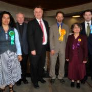 FIGHT: From left, Sushila Dhall (Green), the Rev David Perry, who chaired the meeting, Andrew Smith (Lab), Steve Goddard (Lib Dem) Julia Gasper (UKIP), Ed Argar (Con)