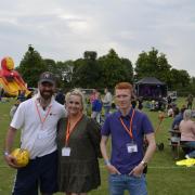 Football club chairman Richard Eltham with event organisers Laura Lynch and Jake Ramshaw