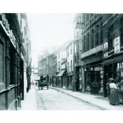 Looking down St Ebbe's towards Cape's the cash drapers early last century.