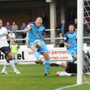 Skipper James Constable scores at the second attempt to give Oxford United a first-half lead at Hereford on Saturday