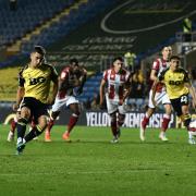 Cameron Brannagan scores Oxford United's second-half penalty against Lincoln City Picture: David Fleming