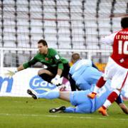 Adam Le Fondre fires past Oxford keeper Ryan Clarke to put Rotherham 2-0 ahead on Saturday