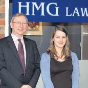 Chief executive of HMG Law Gary Baker with apprentice Jade Bowerman
