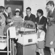 Pupils are shown the incubator they helped to buy in The Cherwell School spina bifida unit at the Radcliffe Infirmary in 1970