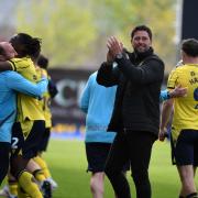 Des Buckingham celebrates at full-time against Peterborough United