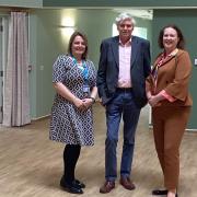 Victoria Prentis (right) with hospice CEO Emma Radley (left) and chair of the board Sir Tim Jenner (centre)