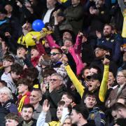 Oxford United fans celebrate the equaliser against Stevenage