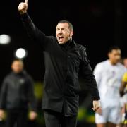 Barnsley boss Neill Collins celebrates after the win at Oxford United in January