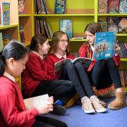 Children at St Francis Primary School using the new library
