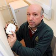 OFTEC's Malcolm Farrow with a carbon monoxide detector