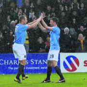 James Constable and Tom Craddock celebrate the former's opening goal
