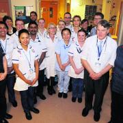 Dr Chris Winnearls and Allie Thornley, front right, with colleagues in the renal unit at the Churchill Hospital, Headington. Picture: OX63423 Damian Halliwell