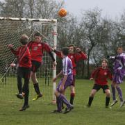 Faringdon’s Tom Lawrence wins this tussle in the game with Botley