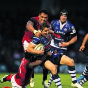 London Welsh’s Daniel Browne and Joe Ajuwa get to grips with Bristol's George Watkins at the Memorial Ground last night