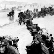The First Bucks, a territorial battalion of the Oxfordshire and  Buckinghamshire Light Infantry, land on Sword Beach on June 6 1944.
