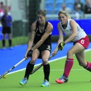 Oxfordshire’s Zoe Shipperley (right) takes on New Zealand's Krystal Forgesson during yesterday’s ladies hockey semi-final  Picture: Ady Kerry