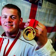 Dan Rivers with his gold medal