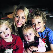 Jill Blackburn with her children, from left, Harry, two,, Matilda, one, and eight-year-old Dylan Hooker