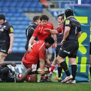 London Welsh No 8 Opeti Fonau is congratulated on his first try against Saracens