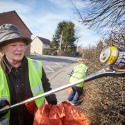 Rosanne Bostock, team leader of OxClean, pictured tidying up in Littlemore during last year’s spring clean initiative. She has also been heavily involved in the national Clean For the Queen campaign that will be held in March