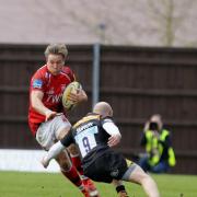 London Welsh’s Will Robinson is tackled by Wasps’ Joe Simpson