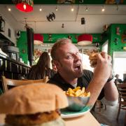 Sharing: Restaurant manager Marten Westergren at Atomic Burger in Cowley Road where all the tips go to the staff
