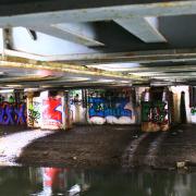 Vandalism or street art? Graffiti under the railway bridge by the canal towpath to Jericho in February this year