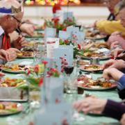 Festive treat: Food, wine and orange juice is in plentiful supply as residents tuck into a beautiful Christmas lunch