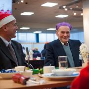 Good to be back: Former Unipart employee Roy Croucher, right, shares a joke with Michael Krasser, sanctuary care client relations manager for Age UK