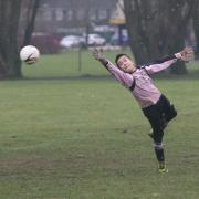 Oxford Blackbirds Under 13 keeper Mikolaj Thompson makes a flying save to deny Horspath