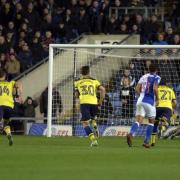 Charlie Mulgrew (left) hammers in the penalty to put Rovers 3-0 up after only 22 minutes  Picture: David Fleming