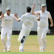Shipton-u-Wychwood V Wokingham..Bowler, Adeel Rehman runs in to celebrate hsi wicket with slips Charlie Miller amd Steve Bates..Picture by: David Fleming.