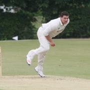 IN THE WICKETS: Tom Costley took 5-38 as Oxford Downs moved just one victory away from the Division 1 title