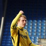 Adam Chapman shows his delight after scoring Oxford United's fourth goal