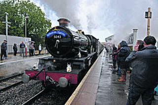 Great Western Railway Castle Class locomotive No 5043 Earl of Mount Edgcumbe is seen awaiting departure from Charlbury en route to Oxford and London on September 17, 2011, at the head of the Cathedrals Express.