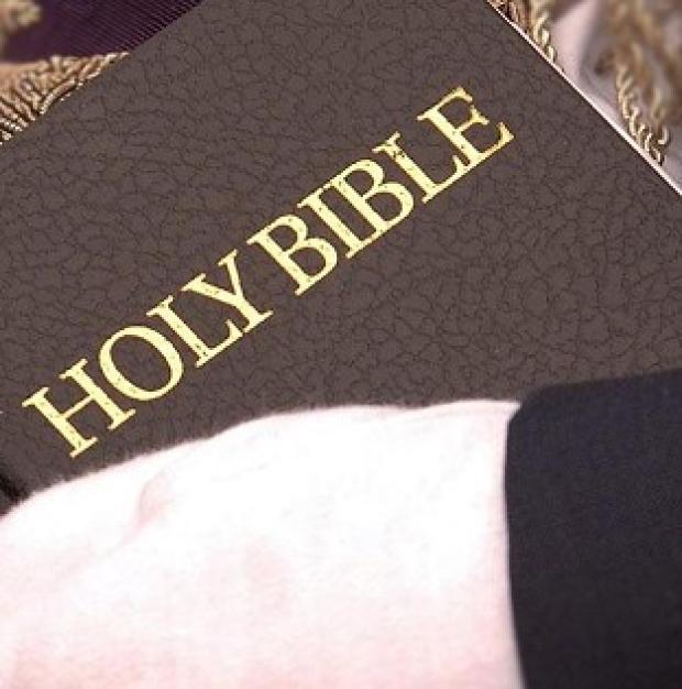 The National Secular Society won a test case in its bid to outlaw prayers before local council meetings
