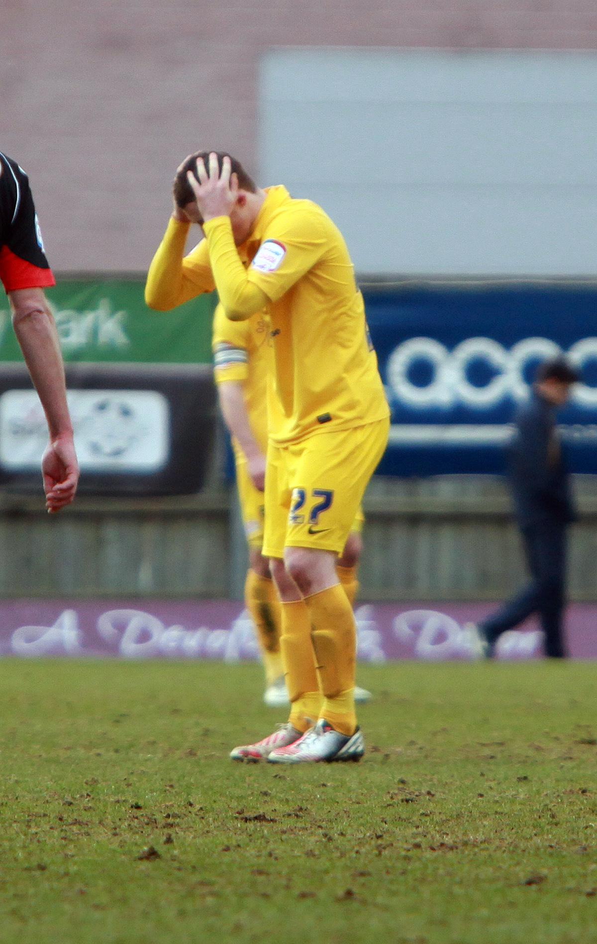 Oxford United were hit by a body-blow as Morecambe scored with just seconds remaining to claim a share of the points. 