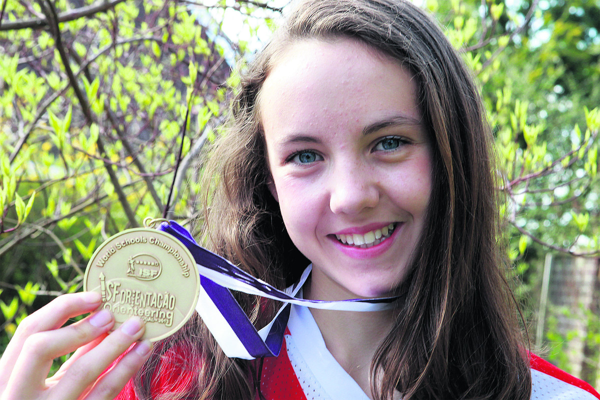 Fiona Bunn with the medal she won at the World Schools Orienteering Championships in Portugal - 2426272