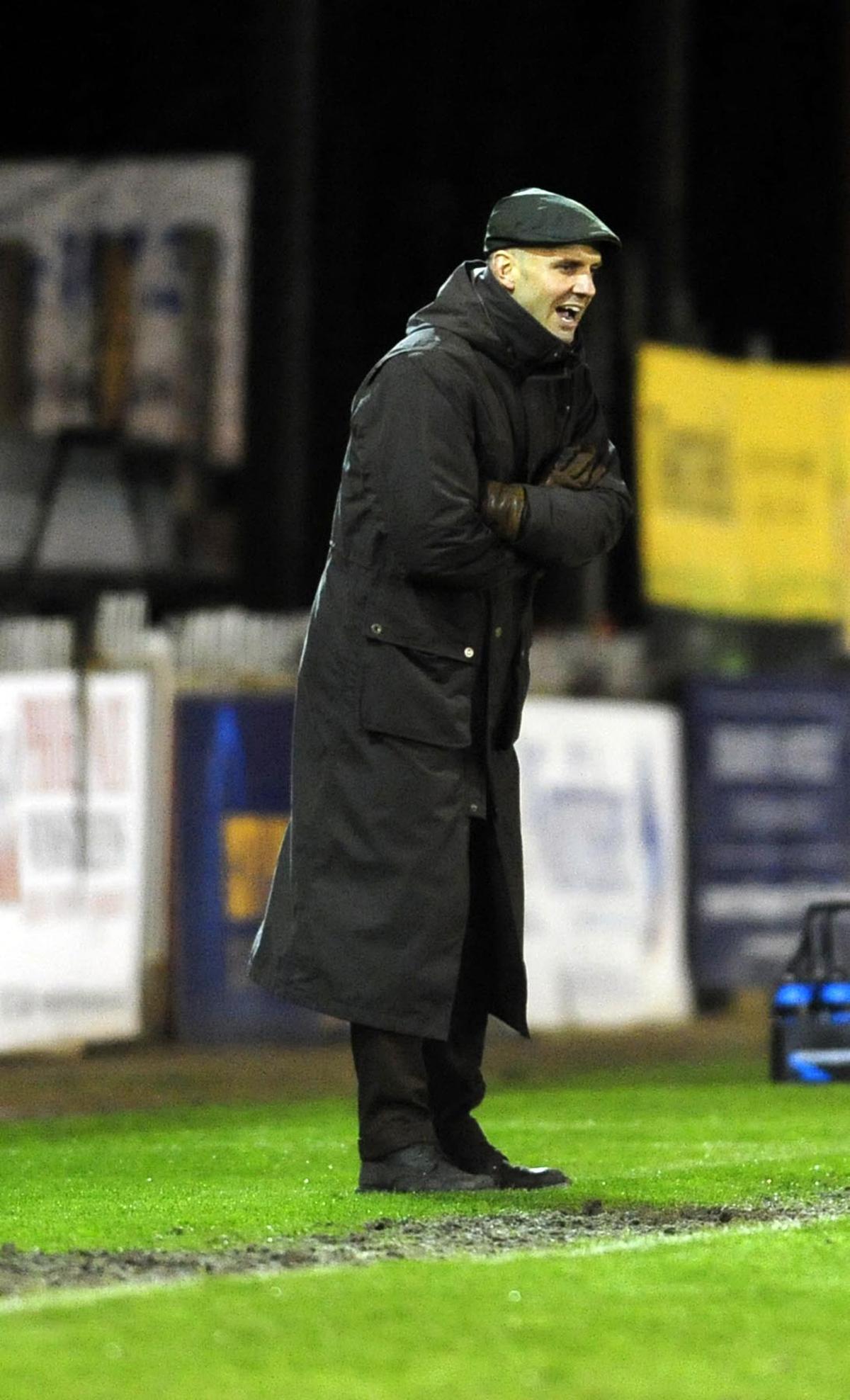 Pictures from Mickey Lewis' first game in charge as manager, a 0-0 away game at Exeter.