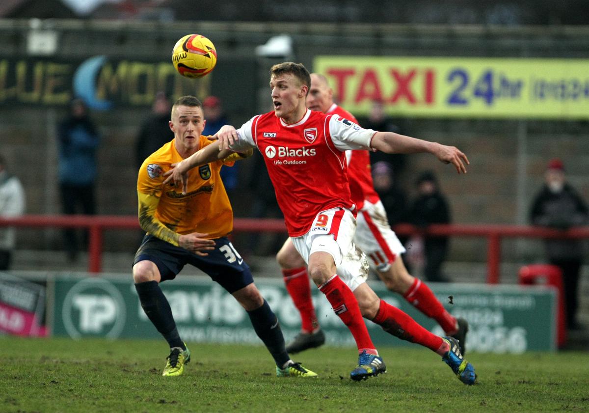 Action from Morecambe v Oxford United
